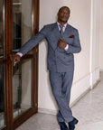 100% Mohair Wool Worsted. Single-breasted jacket w/ one button. Black silk satin shawl collar. Classic pockets. Buttons lined in silk satin. Button holes, pockets, undercollar & finishing touches are handmade. Fitted yet extremely comfortable. TROUSERS: Classic Tuxedo, w/ side band black silk satin. One pleats, slim, w/ internal buttons for suspenders w/ a black silk satin cummerbund & the sweet touch of a black bow-tie.  Also available in blue.|Sartoria Dei Duchi-Atri