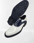 Classic Golf shoe - Handmade Classic Golf shoes, in white and dark blue colors, 100% made in Italy with genuine leather and with soft spikes golf outsole, soft and flexible extra light wedge sole with leather mid-sole. BLAKE processing. Regular shape suitable for a large audience. Ideal to wear during your golf matches | Sartoria Dei Duchi-Atri