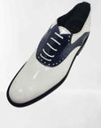 Classic Golf shoe - Handmade Classic Golf shoes, in white and dark blue colors, 100% made in Italy with genuine leather and with soft spikes golf outsole, soft and flexible extra light wedge sole with leather mid-sole. BLAKE processing. Regular shape suitable for a large audience. Ideal to wear during your golf matches | Sartoria Dei Duchi-Atri