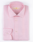 “HAMPTON SHIRT” is realized with a 140/2 cotton  twill by Thomas Mason "Hampton", in pink color.  This long sleeve shirt is made with a semi French  collar and a rounded wrist. The stitching is 5 mm  and the buttons,applied by hand,are in mother of  pearl Australia.The fit is regular-Sartoria Dei Duchi-Atri